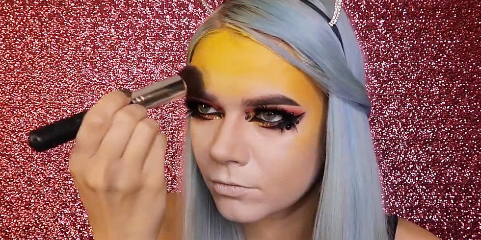 STEP 1: APPLY YELLOW FACE PAINT.