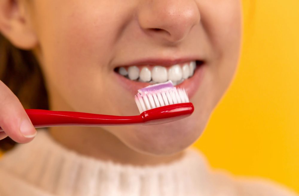 Using tooth whitening toothpaste