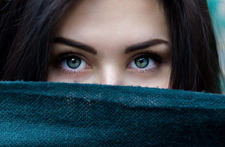eyes; eyelashes; mysterious woman; powerful gaze