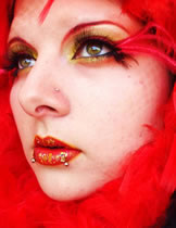 Featured Model wearing Elise Faux eyelashes #135 long feather lashes.