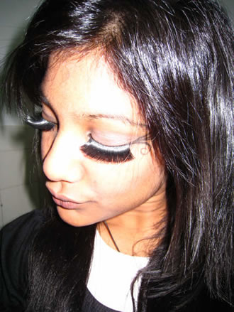 Elise Faux Eyelashes #013 are long and full eyelashes, with three rows of tiny glitter dots.
